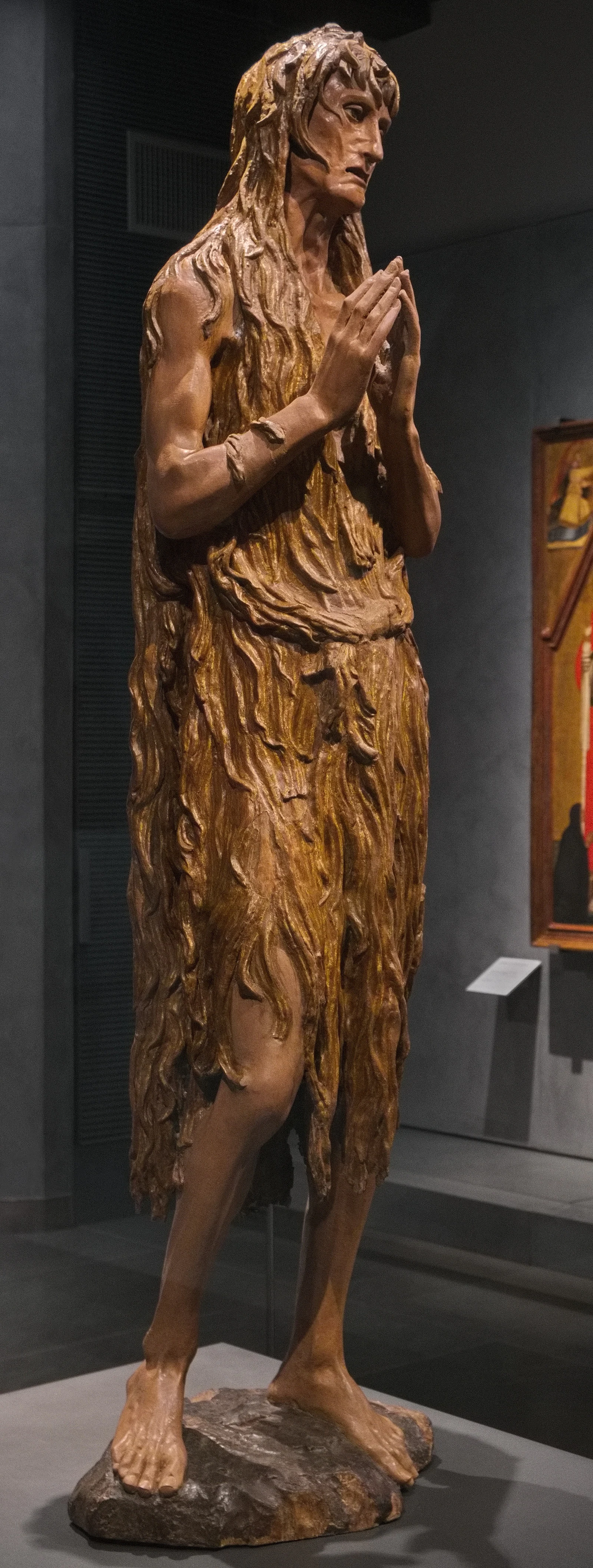 A Madalena Penitente, de Donatello. O contraste com o mármore idealizado do Renascimento é enorme: madeira, corpo magro,